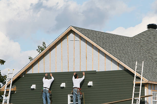 Professional Siding Replacement technician working in Laurel, IN